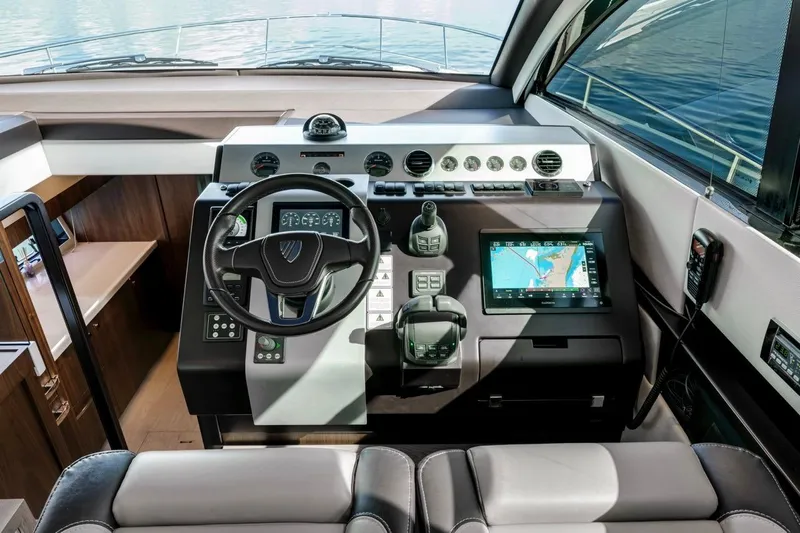  Yacht Photos Pics 2024 Fairline Targa 50 GT helm with modern navigation and control systems.