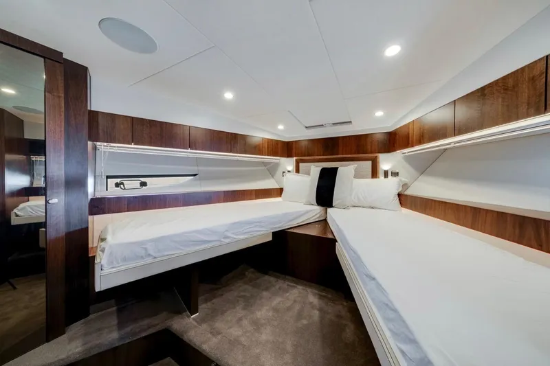  Yacht Photos Pics Luxurious cabin interior of 2024 Fairline Targa 50 GT yacht with twin beds.