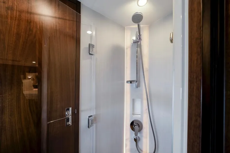  Yacht Photos Pics Luxurious shower interior of 2024 Fairline Targa 50 GT yacht.