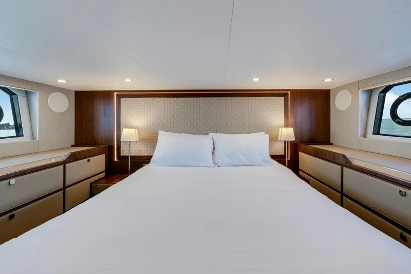  Yacht Photos Pics Luxurious bedroom interior of 2024 Fairline Targa 50 GT yacht with elegant design.