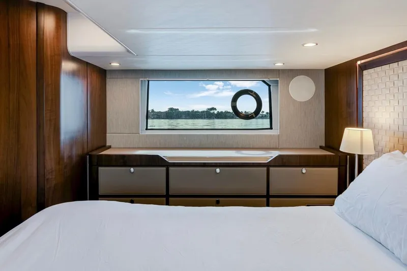  Yacht Photos Pics Luxurious cabin interior of 2024 Fairline Targa 50 GT yacht with elegant wood finish.