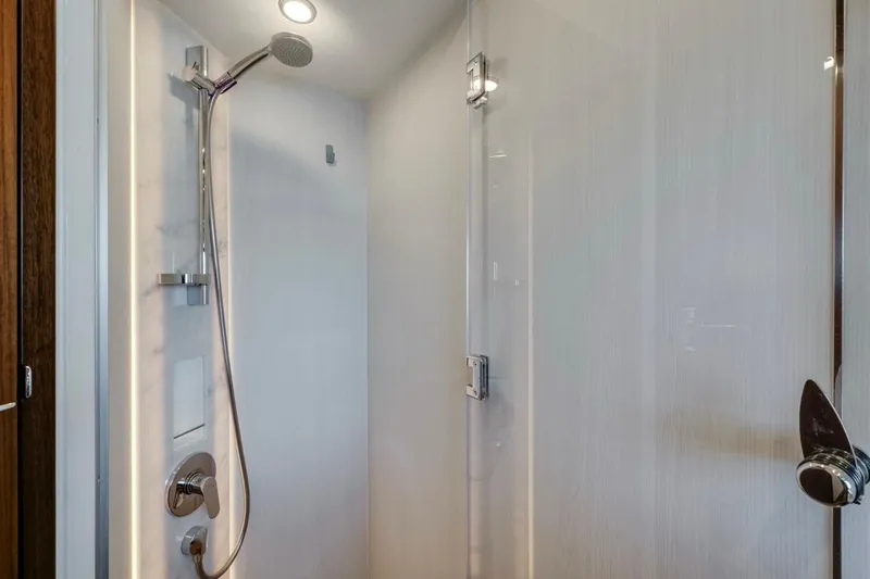  Yacht Photos Pics Modern shower in 2024 Fairline Targa 50 GT yacht, featuring sleek fixtures and glass door.