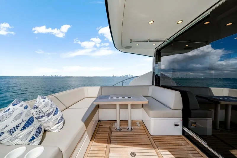 Yacht Photos Pics Luxurious 2024 Fairline Targa 50 GT yacht deck with ocean view and elegant seating.