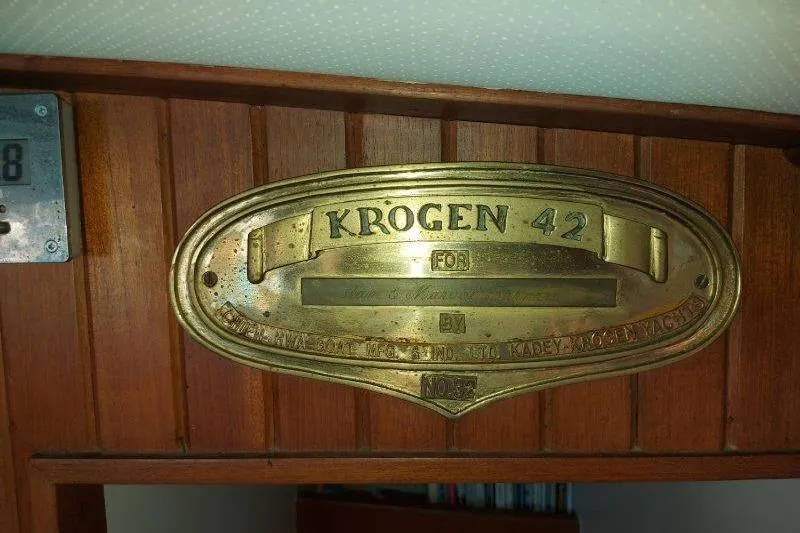 Kallisto Yacht Photos Pics Brass nameplate on 1982 Kadey-Krogen Krogen 42 Trawler, mounted on wooden panel.