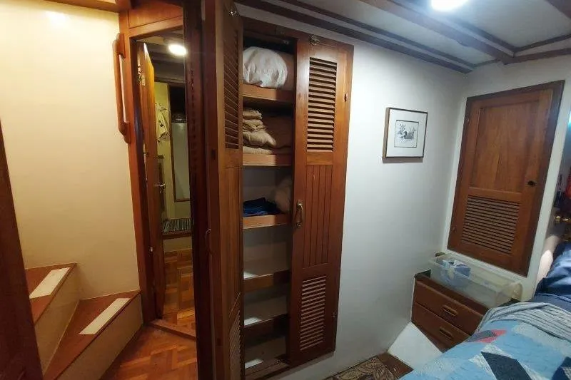 Kallisto Yacht Photos Pics Interior of 1982 Kadey-Krogen Krogen 42 Trawler with wooden cabinetry and cozy decor.
