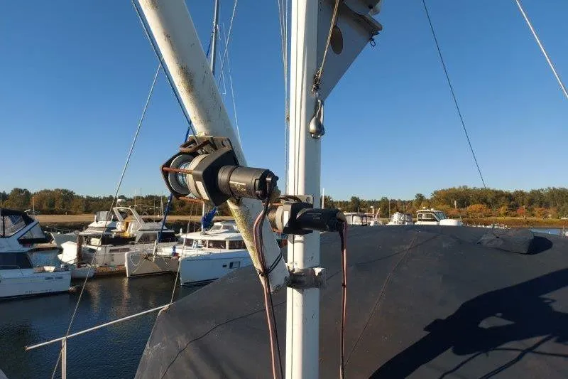 Kallisto Yacht Photos Pics 1982 Kadey-Krogen Krogen 42 Trawler mast detail with marina background.