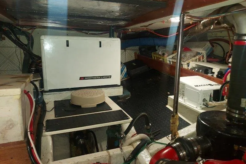 Kallisto Yacht Photos Pics Engine room of a 1982 Kadey-Krogen Pilothouse with Northern Lights generator.
