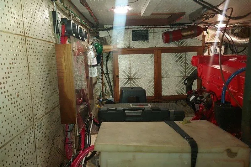 Kallisto Yacht Photos Pics Engine room of a 1982 Kadey-Krogen Pilothouse with tools and equipment.