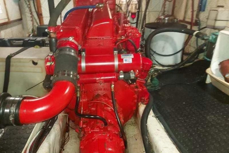 Kallisto Yacht Photos Pics Red engine in 1982 Kadey-Krogen Pilothouse boat, detailed view of machinery.