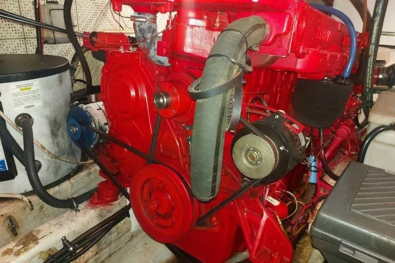Kallisto Yacht Photos Pics 1982 Kadey-Krogen Pilothouse engine room with red machinery and components.
