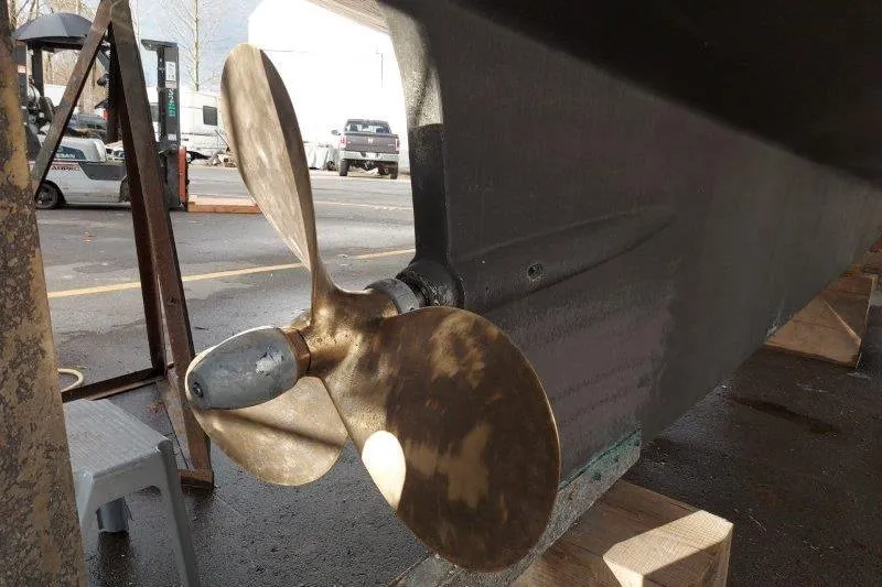Kallisto Yacht Photos Pics 1982 Kadey-Krogen Pilothouse boat propeller in a shipyard setting.