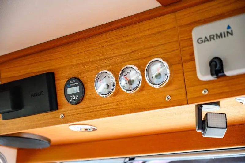  Yacht Photos Pics Control panel of 2023 Targa 27.2 with gauges and Garmin device.