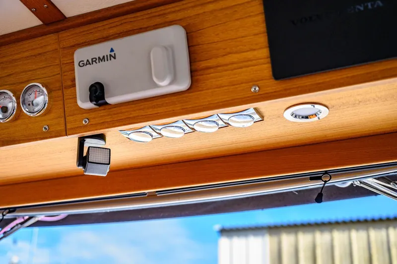  Yacht Photos Pics Interior of 2023 Targa 27.2 boat with Garmin navigation system and gauges.