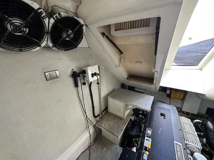 Volk Yacht Photos Pics Engine room of 2009 Lazzara LSX 75 yacht with equipment and ventilation fans.