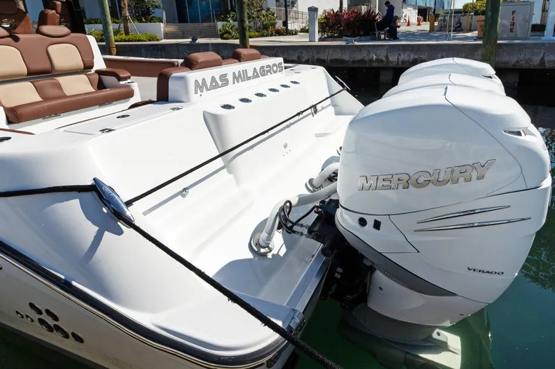  Yacht Photos Pics 2023 HCB Speciale boat with Mercury Verado engines docked at marina.