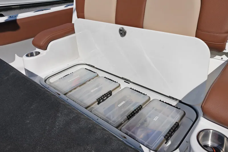  Yacht Photos Pics 2023 HCB Speciale boat storage compartment with organized tackle boxes.