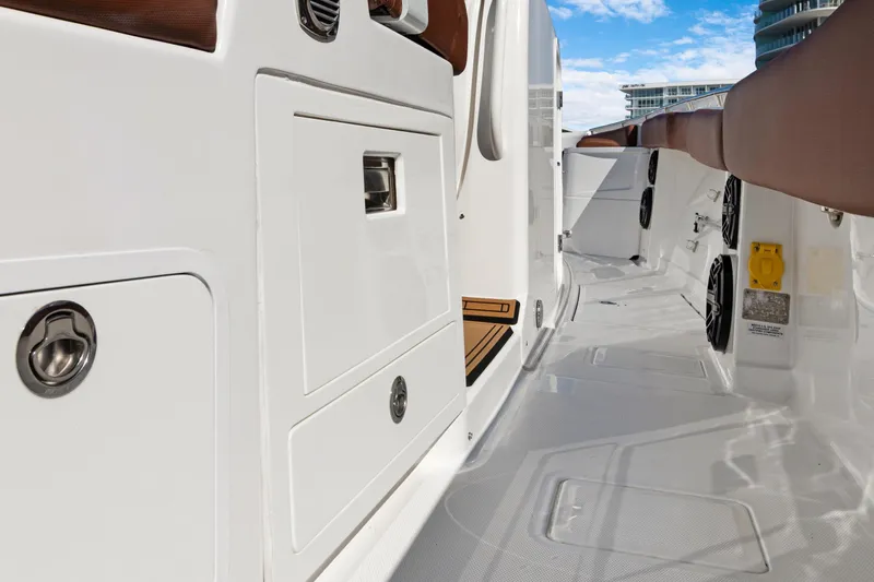  Yacht Photos Pics 2023 HCB Speciale boat interior with sleek white design and modern features.