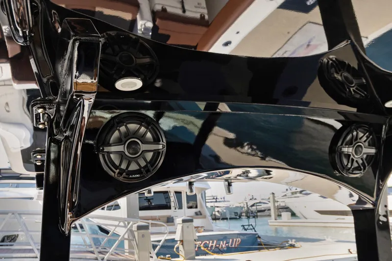  Yacht Photos Pics 2023 HCB Speciale boat with sleek black finish and integrated JL Audio speakers.