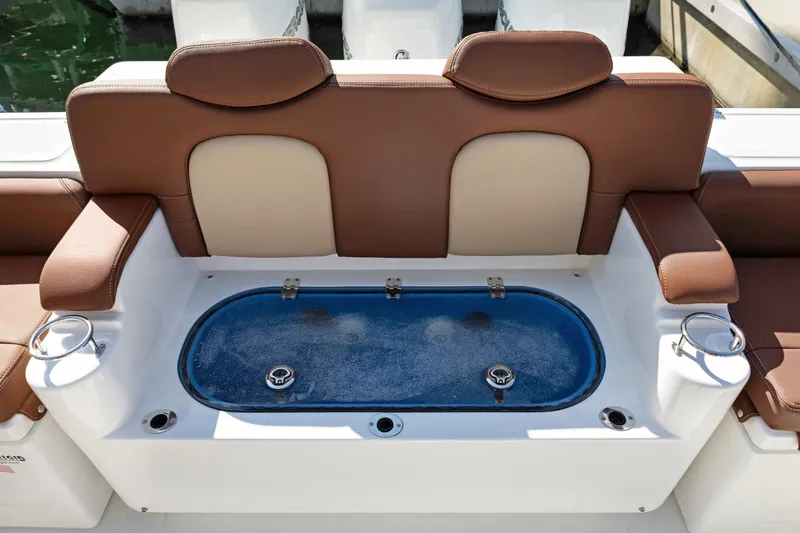  Yacht Photos Pics 2023 HCB Speciale boat seating with integrated livewell and cup holders.