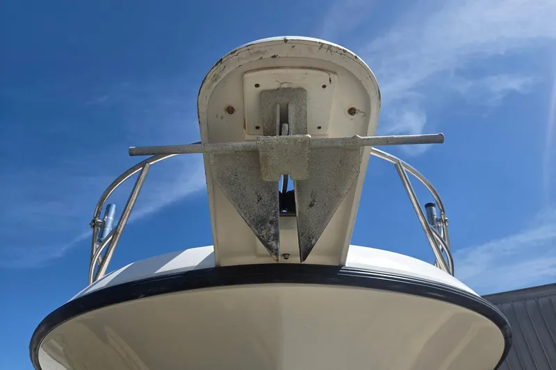 Smooth Operator Yacht Photos Pics 2008 True World Marine TE2810 boat anchor against blue sky.