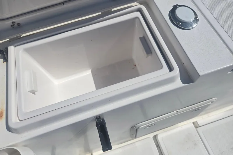 Smooth Operator Yacht Photos Pics Open storage compartment on 2008 True World Marine TE2810 boat.