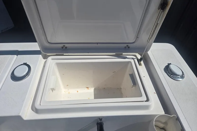 Smooth Operator Yacht Photos Pics Open storage compartment on 2008 True World Marine TE2810 boat.