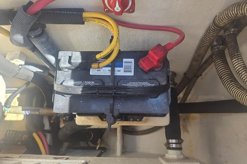 Smooth Operator Yacht Photos Pics Battery setup in a 2008 True World Marine TE2810 boat engine compartment.