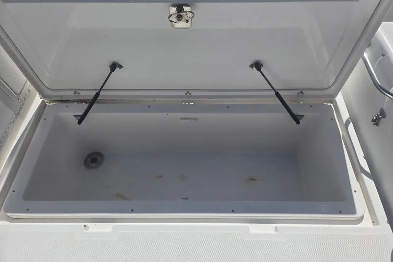 Smooth Operator Yacht Photos Pics Open storage compartment on 2008 True World Marine TE2810 boat.