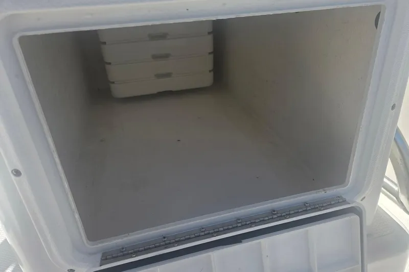 Smooth Operator Yacht Photos Pics Open storage compartment on a 2008 True World Marine TE2810 boat.