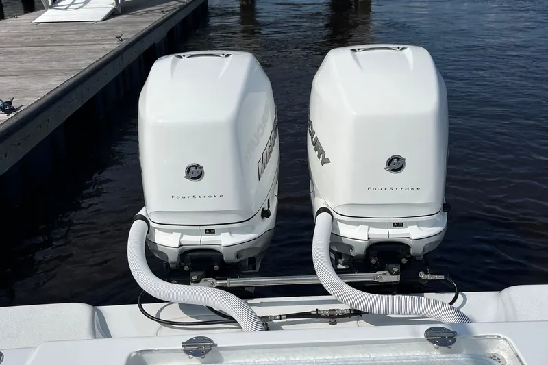 Lunasea Yacht Photos Pics 2023 Yellowfin 32 Offshore boat with twin Mercury FourStroke engines at dock.