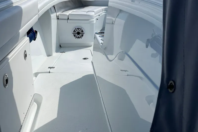 Lunasea Yacht Photos Pics 2023 Yellowfin 32 Offshore boat interior with seating and storage compartments.
