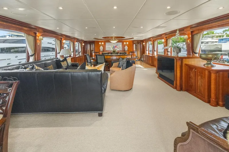  Yacht Photos Pics Luxurious interior of 1999 Trinity Yachts Raised Pilothouse with elegant furnishings and decor.