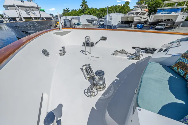  Yacht Photos Pics Deck of 1999 Trinity Yachts Raised Pilothouse with winches and seating area.