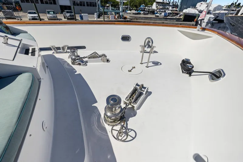  Yacht Photos Pics Deck of 1999 Trinity Yachts Raised Pilothouse with winches and cleats.