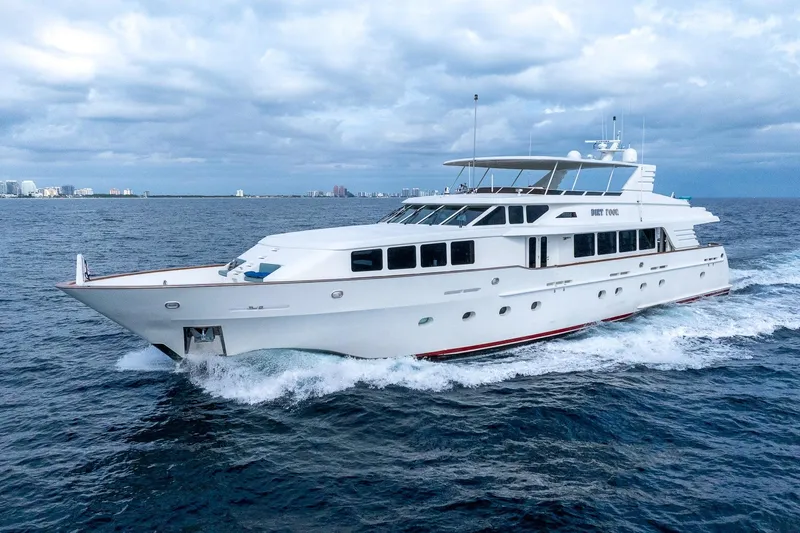  Yacht Photos Pics Luxurious 1999 Trinity Yachts Raised Pilothouse cruising on open water.