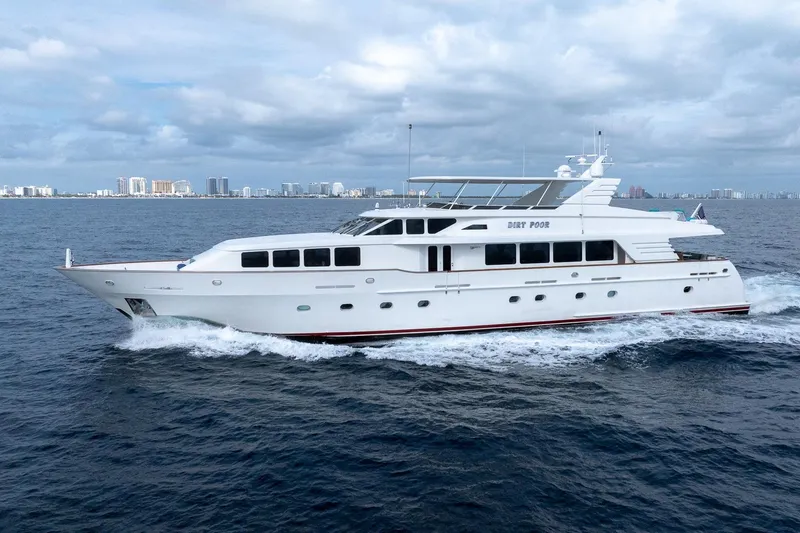  Yacht Photos Pics Luxury 1999 Trinity Yachts Raised Pilothouse cruising on open water.