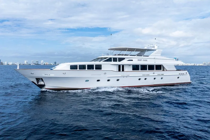  Yacht Photos Pics Luxurious 1999 Trinity Yachts Raised Pilothouse cruising on open water.