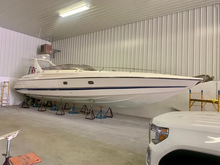 Tude Yacht Photos Pics 1995 Sunseeker Apache 45 yacht in indoor storage facility.