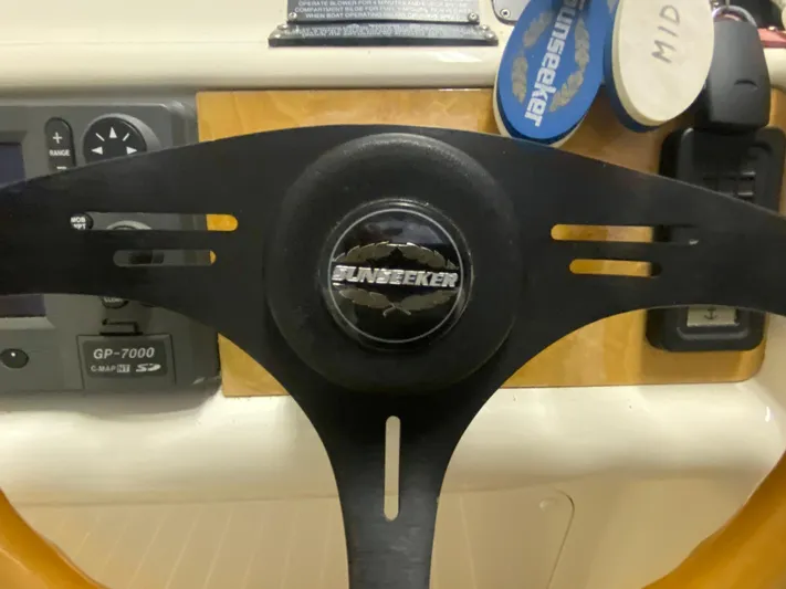 Tude Yacht Photos Pics Steering wheel and dashboard of a 1995 Sunseeker Apache 45 boat.