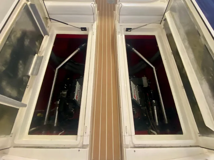 Tude Yacht Photos Pics Engine compartment of a 1995 Sunseeker Apache 45 boat with MerCruiser engines.