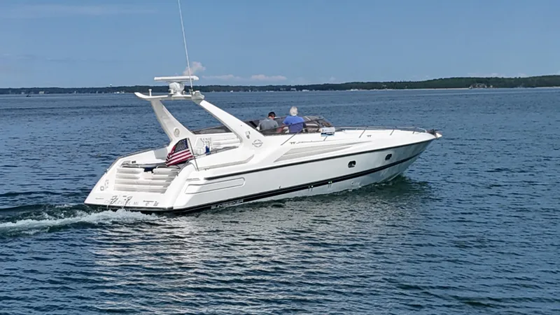 Tude Yacht Photos Pics 1995 Sunseeker Apache 45 yacht cruising on open water.