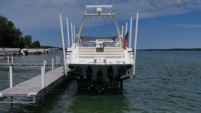 Tude Yacht Photos Pics Sunseeker Apache 45 boat docked on a sunny day, 1995 model.