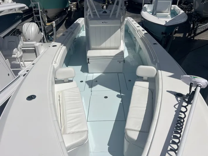  Yacht Photos Pics 2019 Contender 32 ST boat with white seating and spacious deck.
