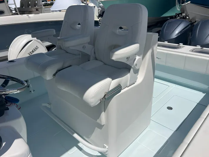  Yacht Photos Pics 2019 Contender 32 ST boat with dual white captain's chairs and Yamaha engines.