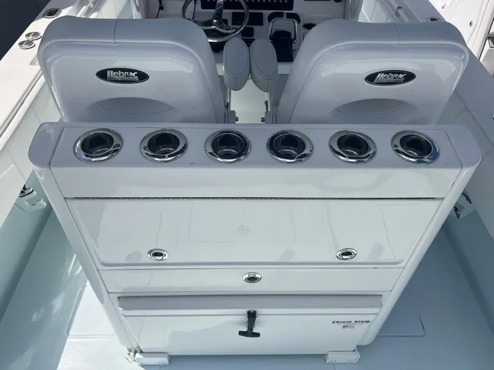  Yacht Photos Pics 2019 Contender 32 ST boat interior with rod holders and seating.