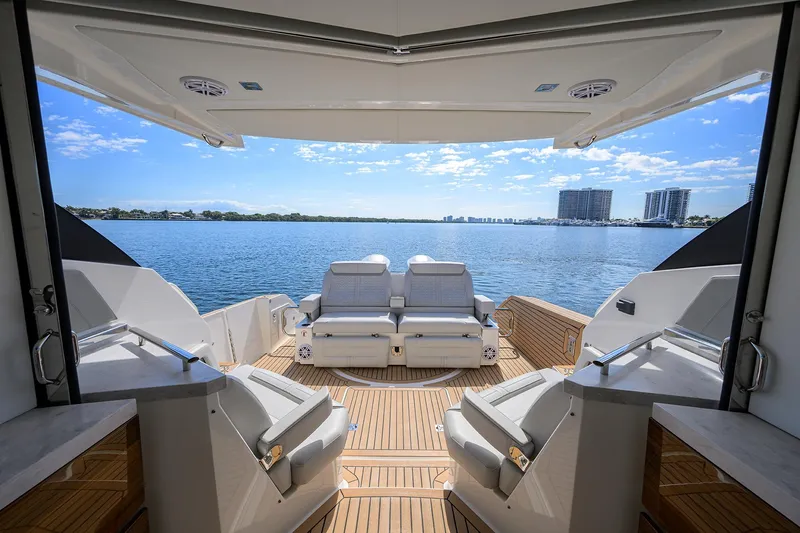  Yacht Photos Pics 2022 Tiara Yachts 43 LE interior with luxurious seating and scenic ocean view.