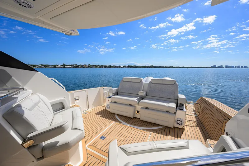  Yacht Photos Pics Luxurious 2022 Tiara Yachts 43 LE deck with plush seating and scenic water view.