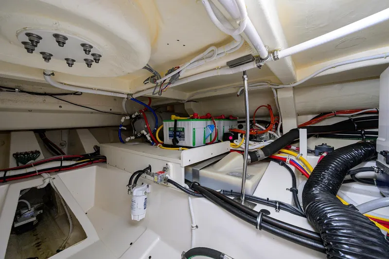  Yacht Photos Pics Engine room of 2022 Tiara Yachts 43 LE, showcasing wiring and components.