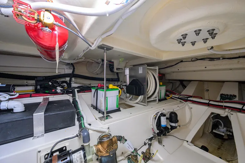  Yacht Photos Pics Engine room of 2022 Tiara Yachts 43 LE, showcasing equipment and wiring.