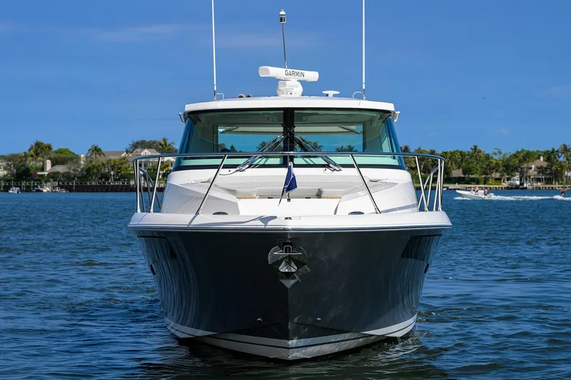  Yacht Photos Pics 2022 Tiara Yachts 43 LE on water, front view, clear sky background.